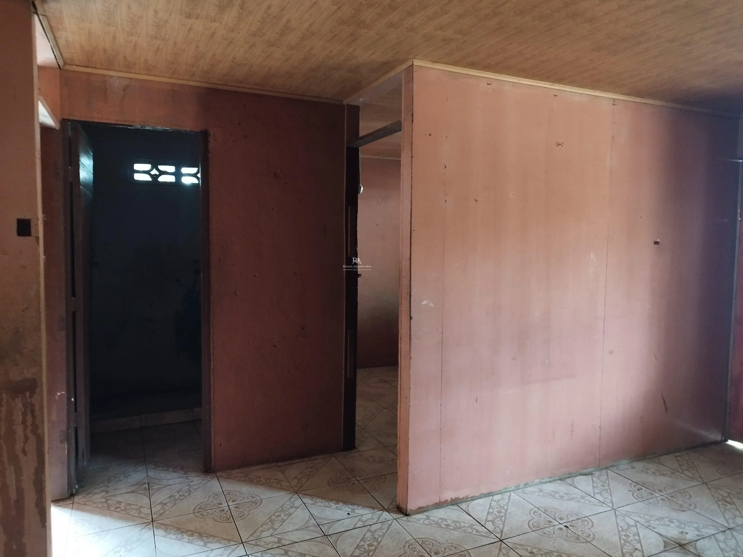 Lote con construcción en Orotina