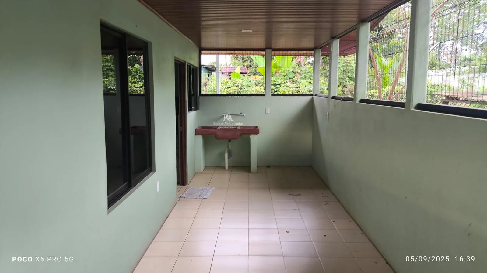 Lote con construcción en Puntarenas