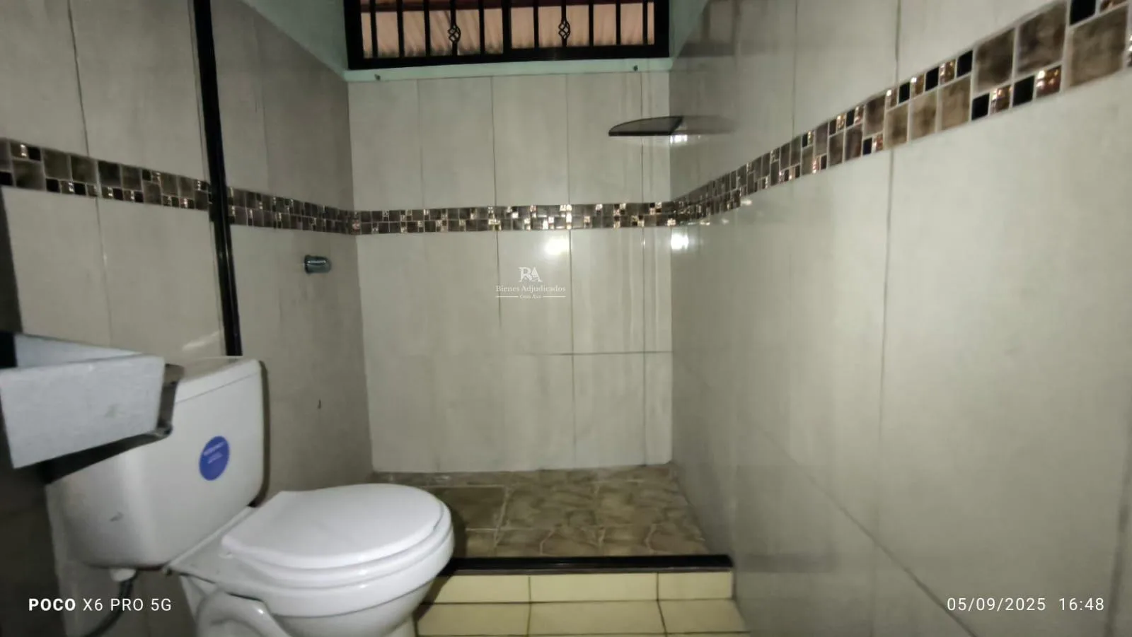 Lote con construcción en Puntarenas