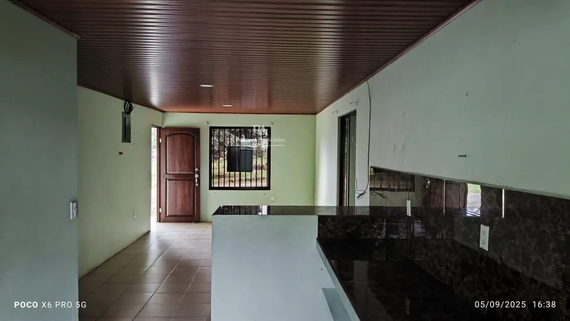 Lote con construcción en Puntarenas