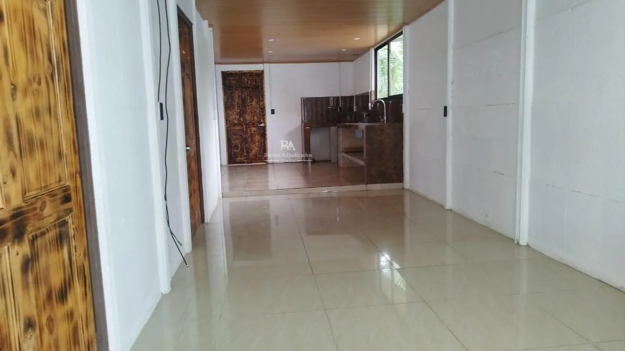 Lote con construcción en Puntarenas
