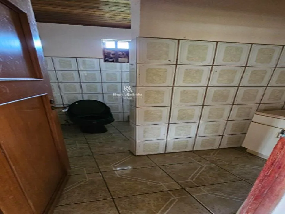 Lote con construcción en San Ramón