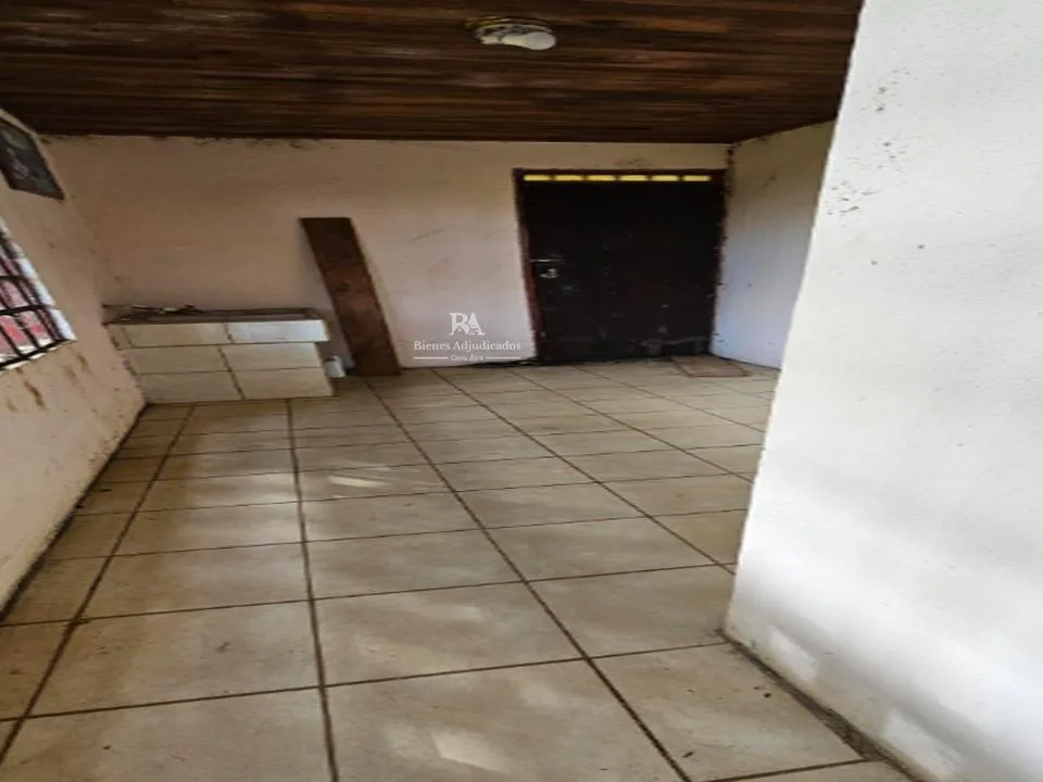 Lote con construcción en San Ramón