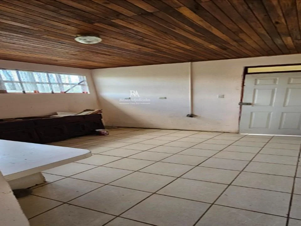 Lote con construcción en San Ramón
