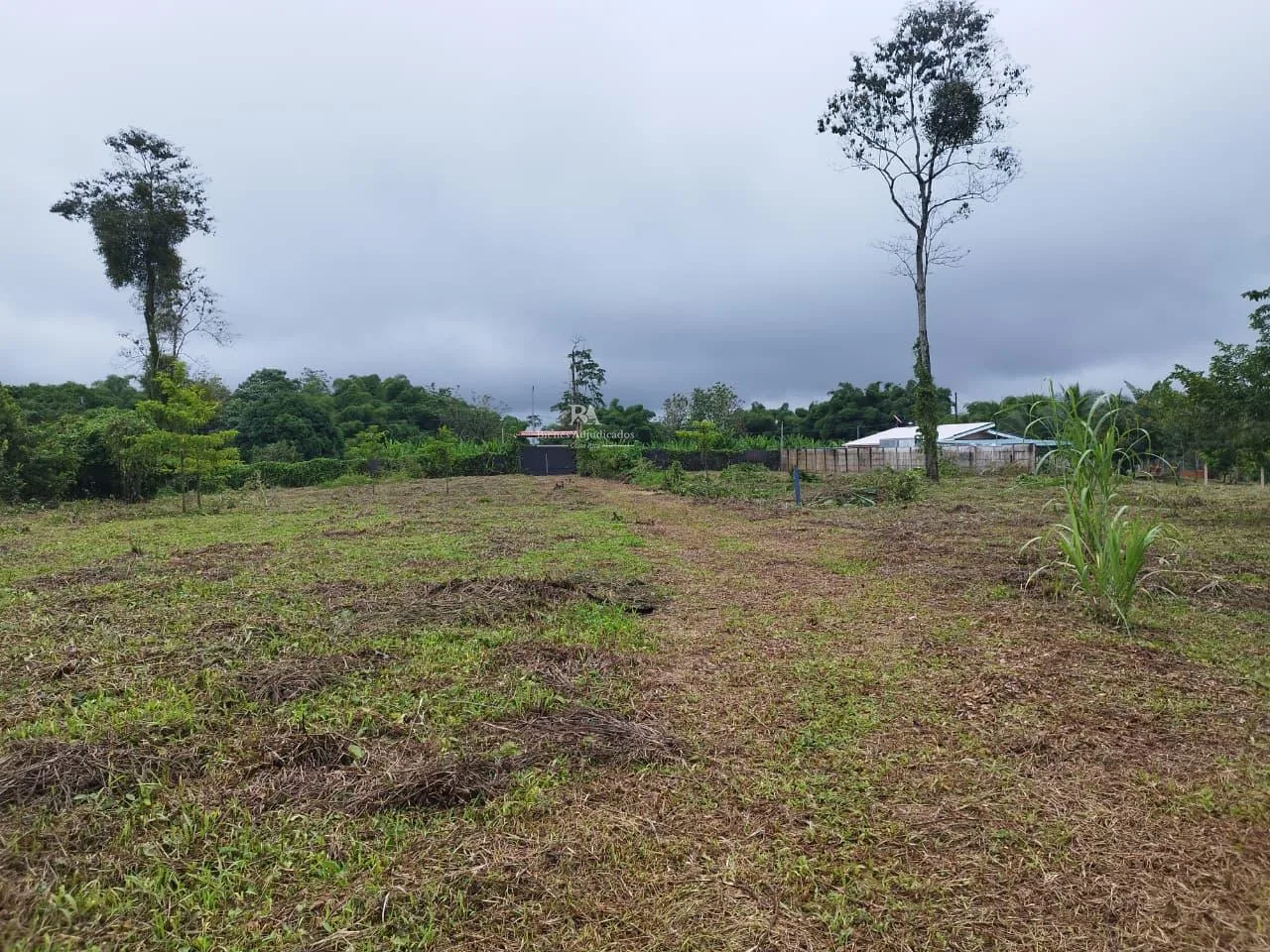 Lote con construcción en Sarapiquí