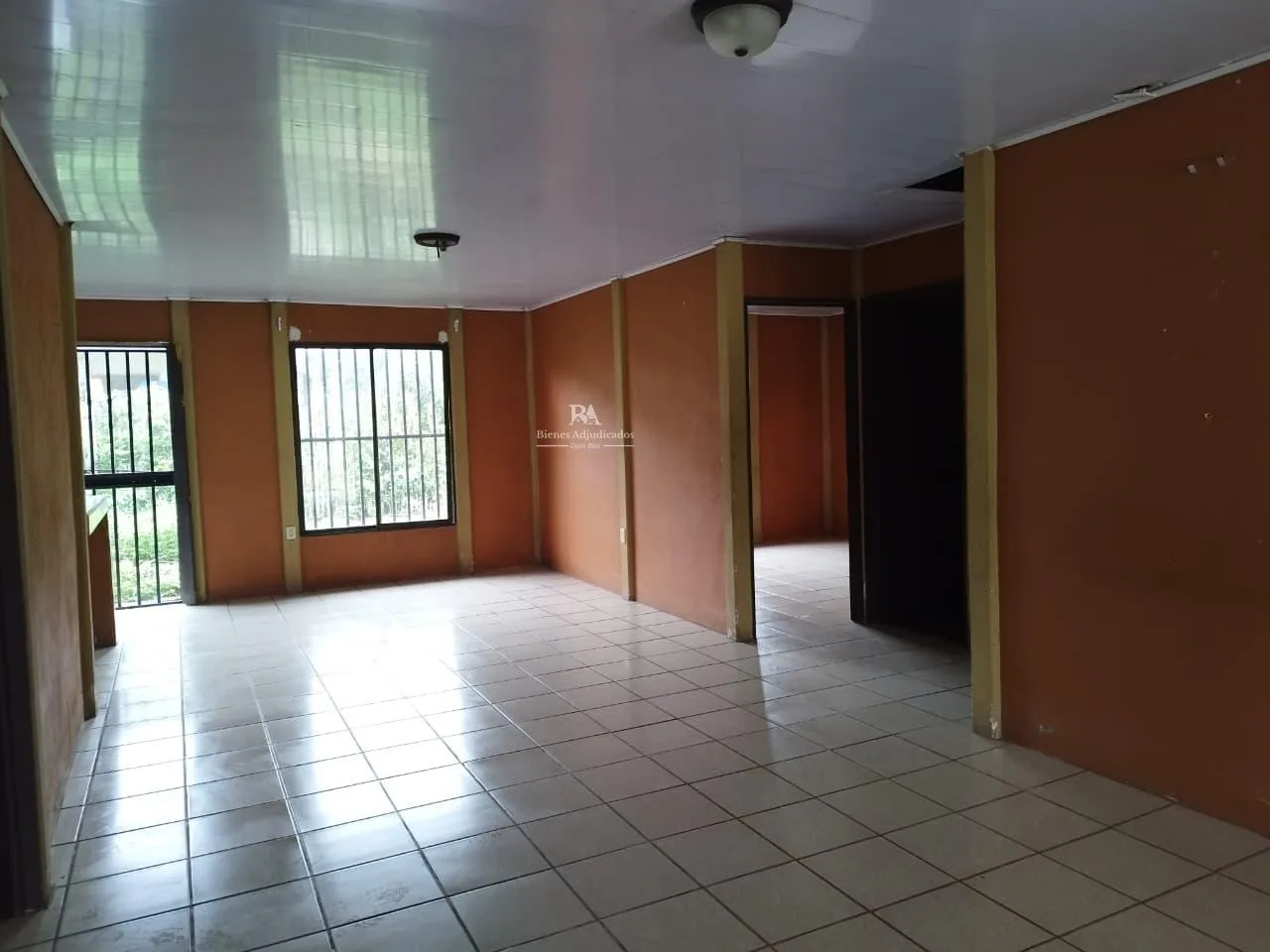 Lote con construcción en Sarapiquí
