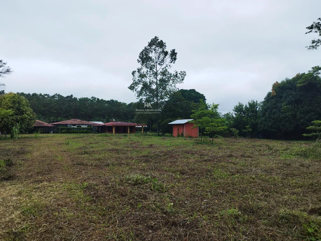 Lote con construcción en Sarapiquí