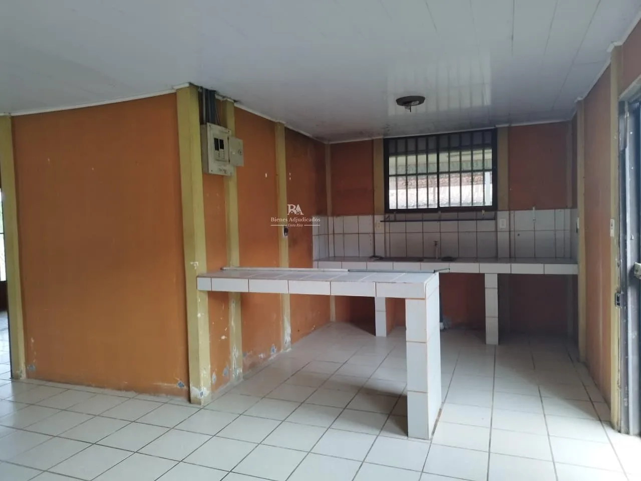 Lote con construcción en Sarapiquí