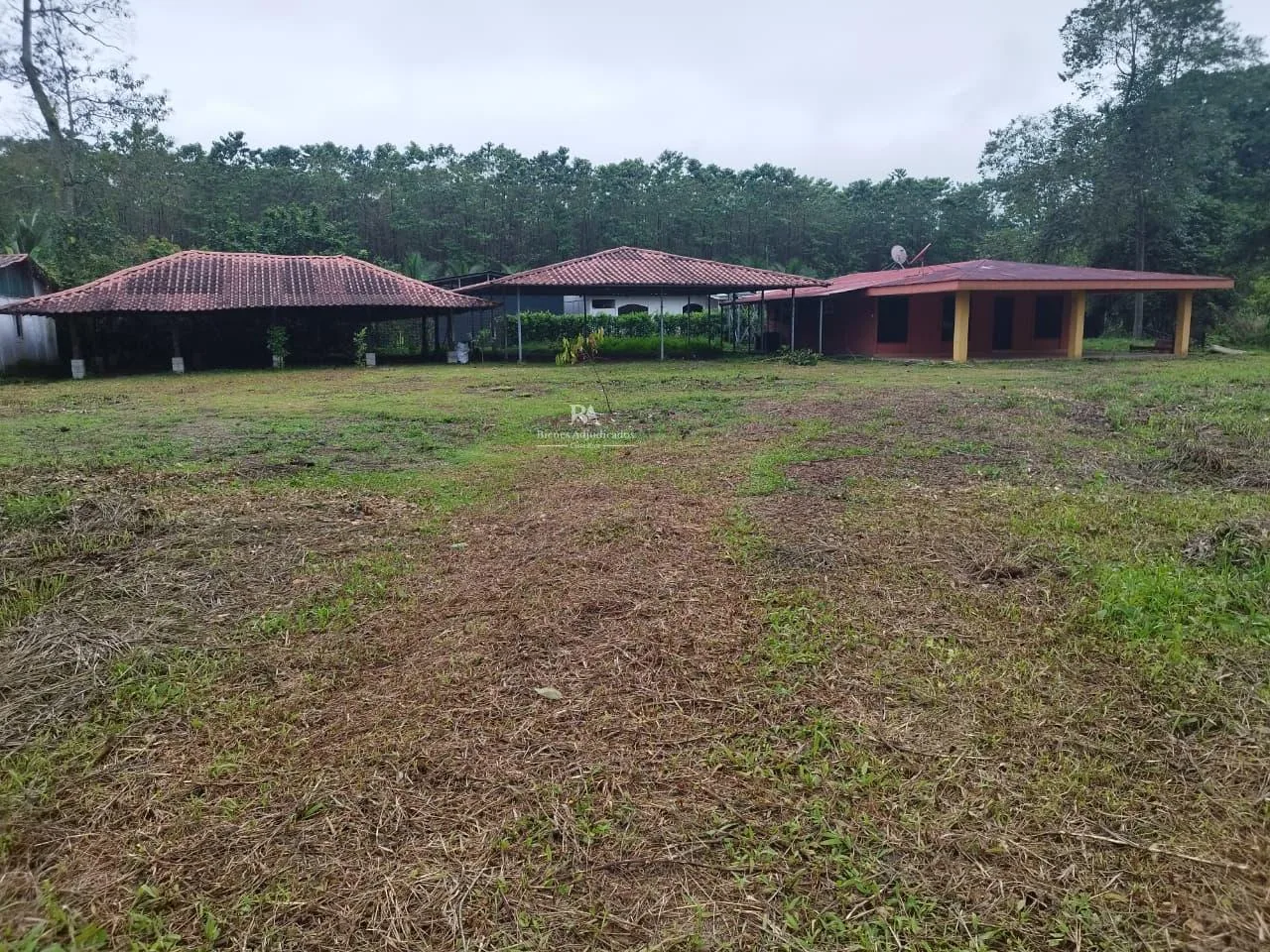 Lote con construcción en Sarapiquí