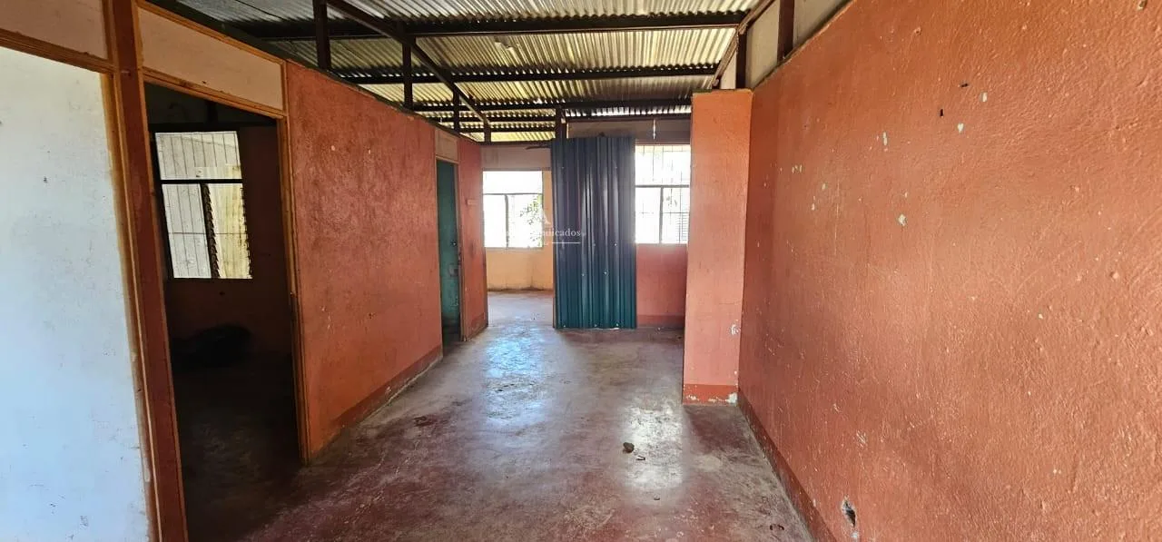 Lote con construcción en Upala